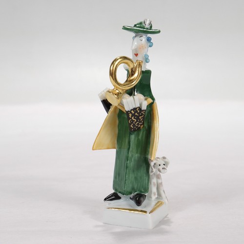 Statuina musicista corno