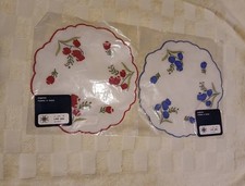 Centrini vintage ricamati a mano in cotone