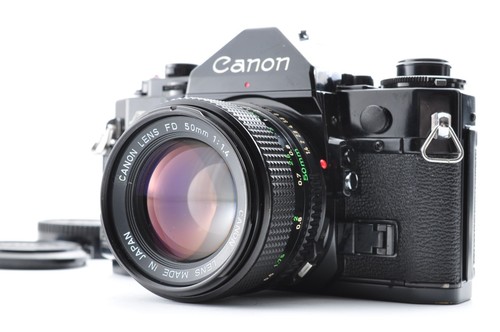 Canon obiettivo nuovo - /,