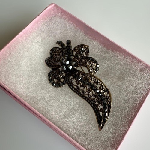 Spilla vintage fiore oro nero