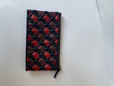 Elegante pochette di Marni. Intreccio in pelle