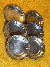 set di piattini argentati
