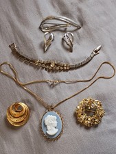 Spille, orecchini, bracciale e