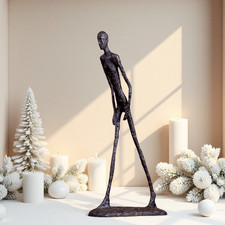 Statua in bronzo uomo che