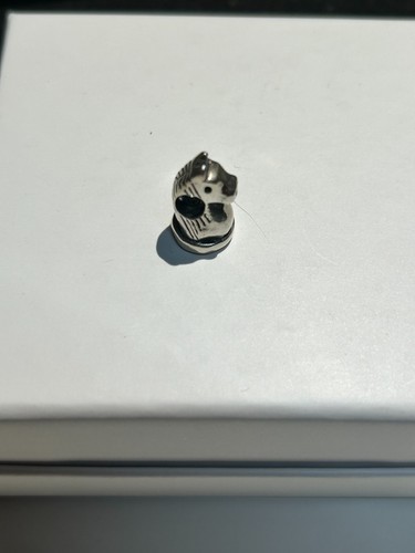 Tedora charm