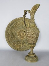 Antique amphora with bronze