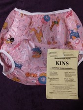 Pantaloni in plastica stile