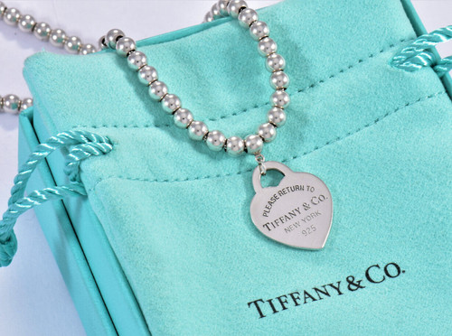 Collana sacchetto perle - e,