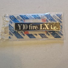 Scritta Cofano Posteriore Originale Lancia Y10 fire LX i.e. Nuova