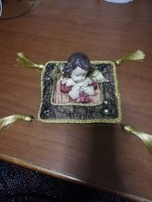 angioletto su cuscino  in