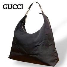 Borsa GUCCI una tracolla nylon mezza luna marrone usata