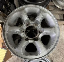 CERCHIO IN LEGA MITSUBISHI PAJERO L200 15X7 POLLICI