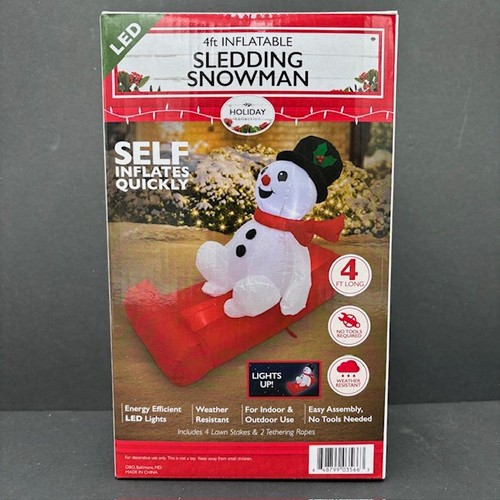 Pupazzo neve slitta - di,