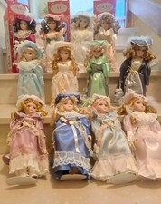 12 bambole di porcellana da