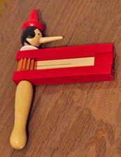 Gioco Raganella Giocattolo Pinocchio In Legno Tric Trac Bambini moc