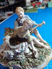 Statuetta Damina  e Suonatore Capodimonte Porcellana italiana 