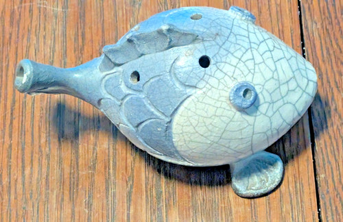 Statuina fischietto pesce