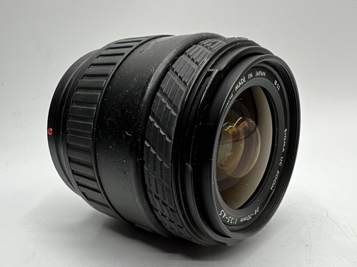 Sigma zoom 70 - sigma, uc