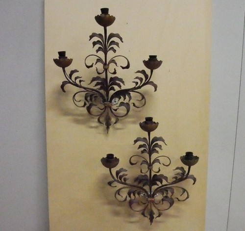 Coppia appliques in - di,