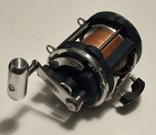 OKUMA T50W MULINELLO DA PESCA BIG GAME TITUS Max Lbs/yds 80/275 ben tenuto