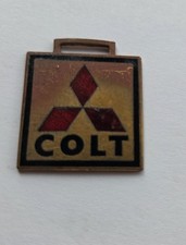 Vintage enamel mitsubishi colt - vintage,