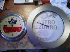2 OROLOGI DA PARETE : ' NASTRO AZZURRO ' + ' KRIPTONITE MOSCA G.M.T. ' !!