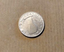5 Lire del 1954 delfino con scritta Romagnoli distante dal bordo