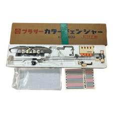 Macchina per maglieria Brother