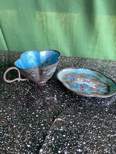 Antica tazza e piattino in