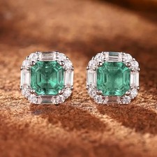 ORECCHINI ENGAGEMENT IN ORO BIANCO 18 KT. TIT. 750 CON SMERALDI E BRILLANTI.