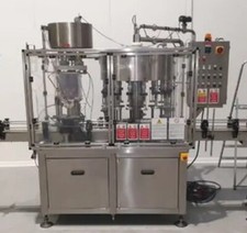 Riempitrice Monoblocco 20/3 5.000 BPH - Bottiglie tipo olio quadro tappo 35x24