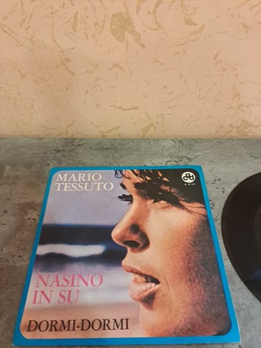 Mario tessuto giri - 45, nasino