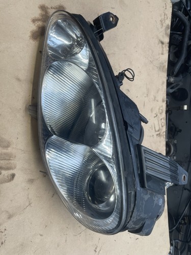 Faro proiettore lato - , sinistro