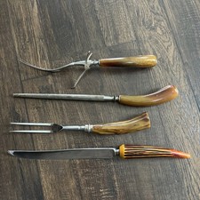 Set intaglio vintage Sheffield corona crest Inghilterra coltello corna osso manici marmorizzati