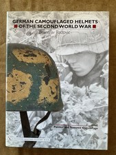 GERMAN CAMOUFLAGED HELMETS OF