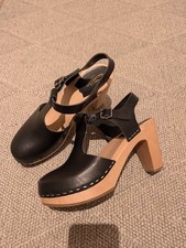 Zoccoli neri in pelle svedese