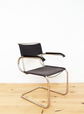 Poltrona con braccioli Marcel