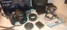 Panasonic LUMIX DMC-FZ8 7,2MP fotocamera digitale testata FUNZIONANTE + caricatore