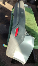 1546303 Paraurti post. centr