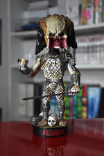 Statua figura testa dondolante