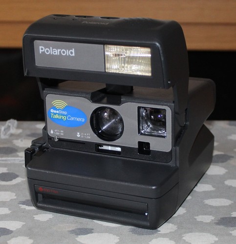 Polaroid one step talk camera - step,
