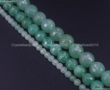 Perline tonde con pietre