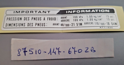 87510-147-670ZB(nos)	ADESIVO