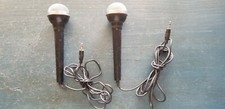Two vintage wired microphones