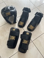 Paratibie e caschetto Leone