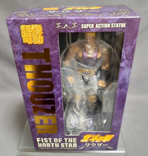 Statua super action pugno - super,