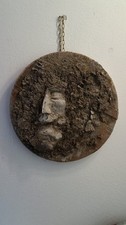 Emersione, scultura argilla