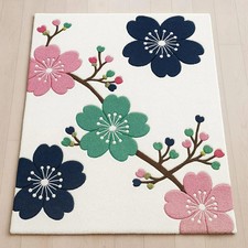 Tappeto trapuntato a mano in