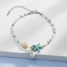 Bracciale classico perle bianche con conchiglia e stelle marine per accessori se