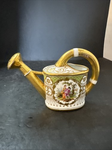 Antico annaffiatoio porcellana